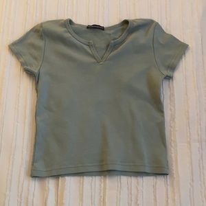 Green Brandy Melville top with little V cutout.
